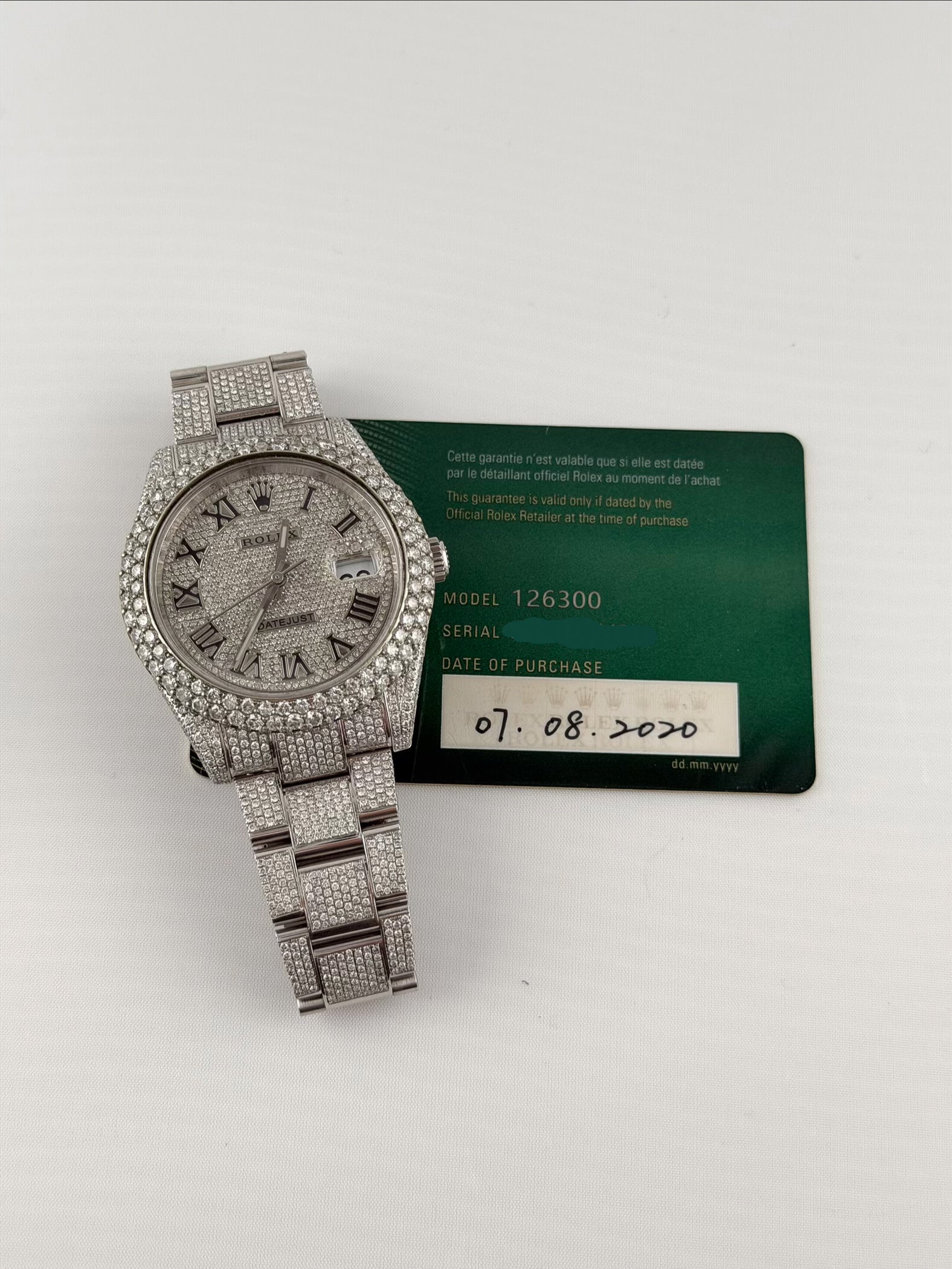Iced out Rolex Roman Numerals